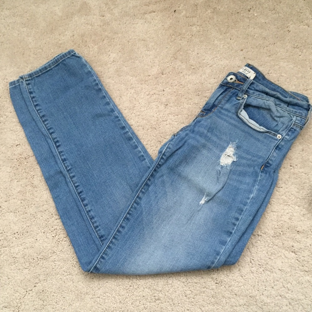 distressed medium/light wash jeans